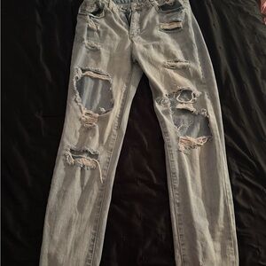 Women Distressed Light Gray Ripped Jeans